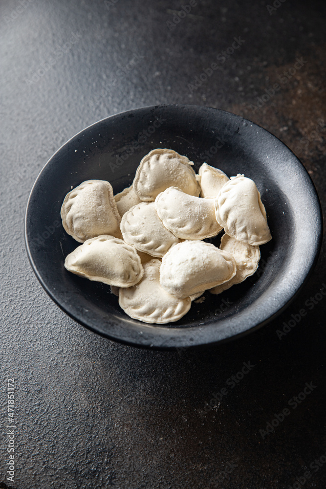 vareniki raw stuffed dumplings ready to cook meal snack on the table copy space food background vareniki raw stuffed dumplings ready to cook meal snack on the table copy space food background