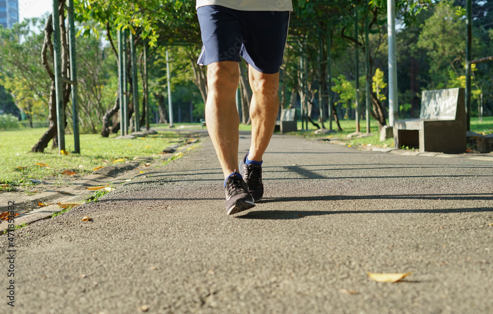 old man running in the park, soft focus.concept health care in elderly people