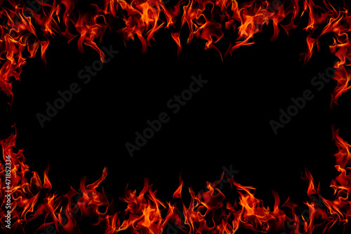Burning orange flames around on a black background.