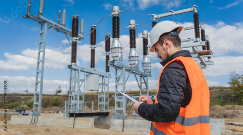 Canvas Print Engineer electrician check the substation construction process