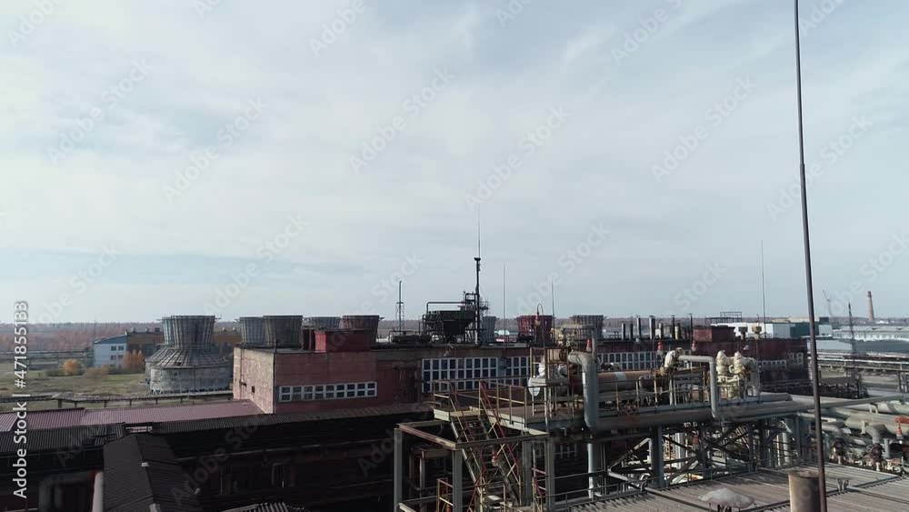 Complex engineering structures of a polymer plant. Summer drone shooting at the factory. Old factory from the times of the USSR Complex engineering structures of a polymer plant. Summer drone shooting at the factory. Old factory from the times of the USSR