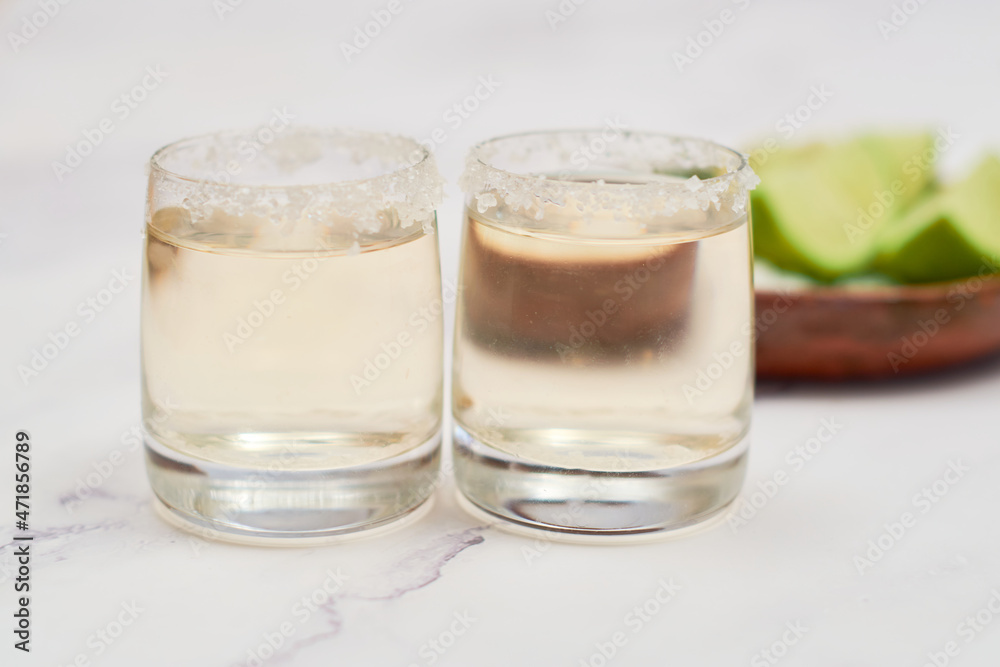 Traditional Tequila Shots with Lime and Salt Traditional Tequila Shots with Lime and Salt