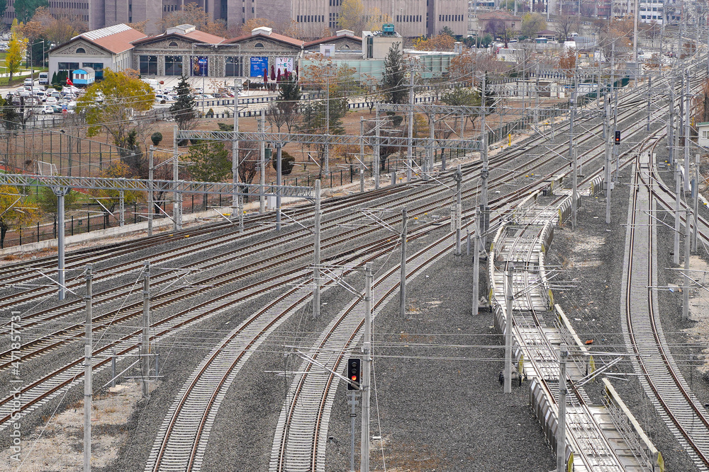 Empty Railroad Lines and Electric Poles Side by Side