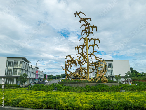 CBD, Cibubur west java. Indonesia Nov 28, 2021.amazing monument  in the middle of the area CBD Cibubur landmark  magnificent view sunrise and sunset. a flock of birds flying photo