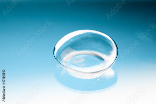 contact lenses on blue backgroundn close up view - Image