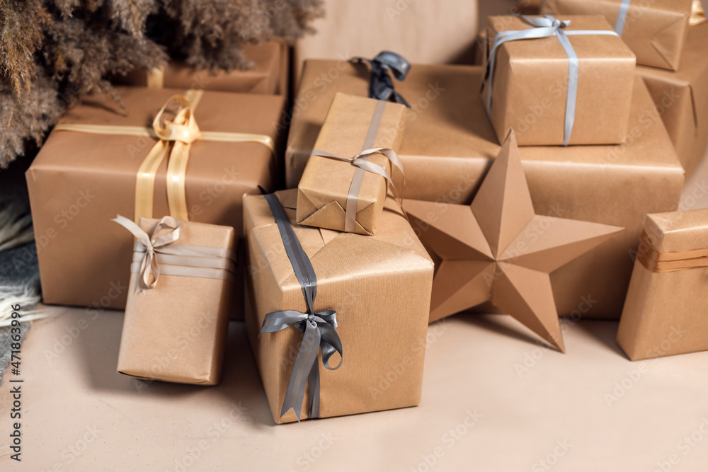 Fototapeta premium Christmas gifts and handmade presents packed in kraft paper