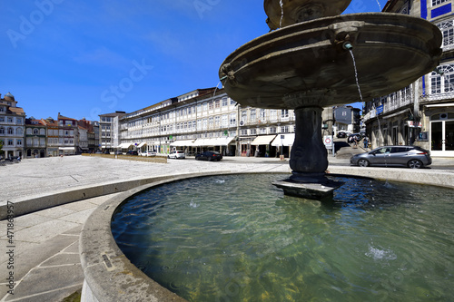 Largo Toural Square fountain, Guimaraes, Minho, Portugal photo