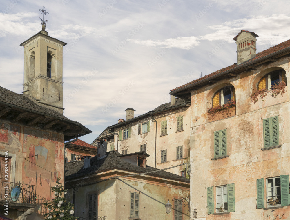 glimpse of the old houses of the picturesque medieval village, Orta San Giulio.Italy
