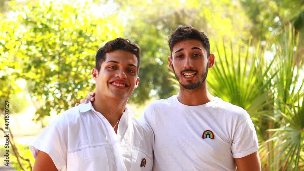 young gay couple embracing and showing their love to everyone young gay couple embracing and showing their love to everyone