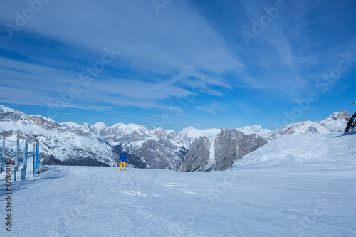 Alpine skier on slope at Cortina © destillat