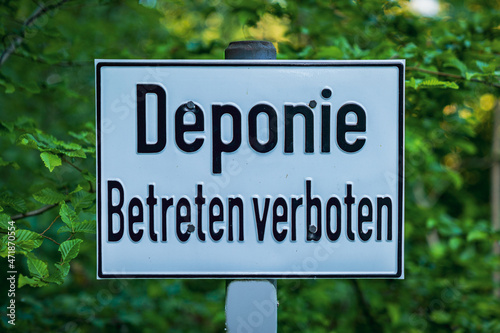 Sign: Deponie Betreten verboten (German for: Landfill, do not enter), seen the Quellenhang am Lintorfer Mark forest in Ratingen, North Rhine-Westphalia, Germany