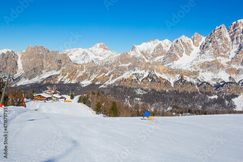 Alpine skier on slope at Cortina