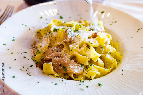 Italian food, firsh course dish, fresh homemade pasta tagliatelle with porcini mushrooms, Parma, Emilia Romagna, Italy photo