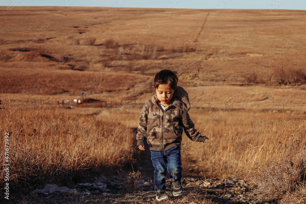 child playing in the field