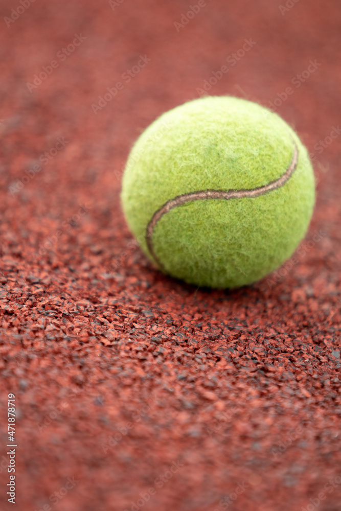 Tennis ball on the map, close-up.