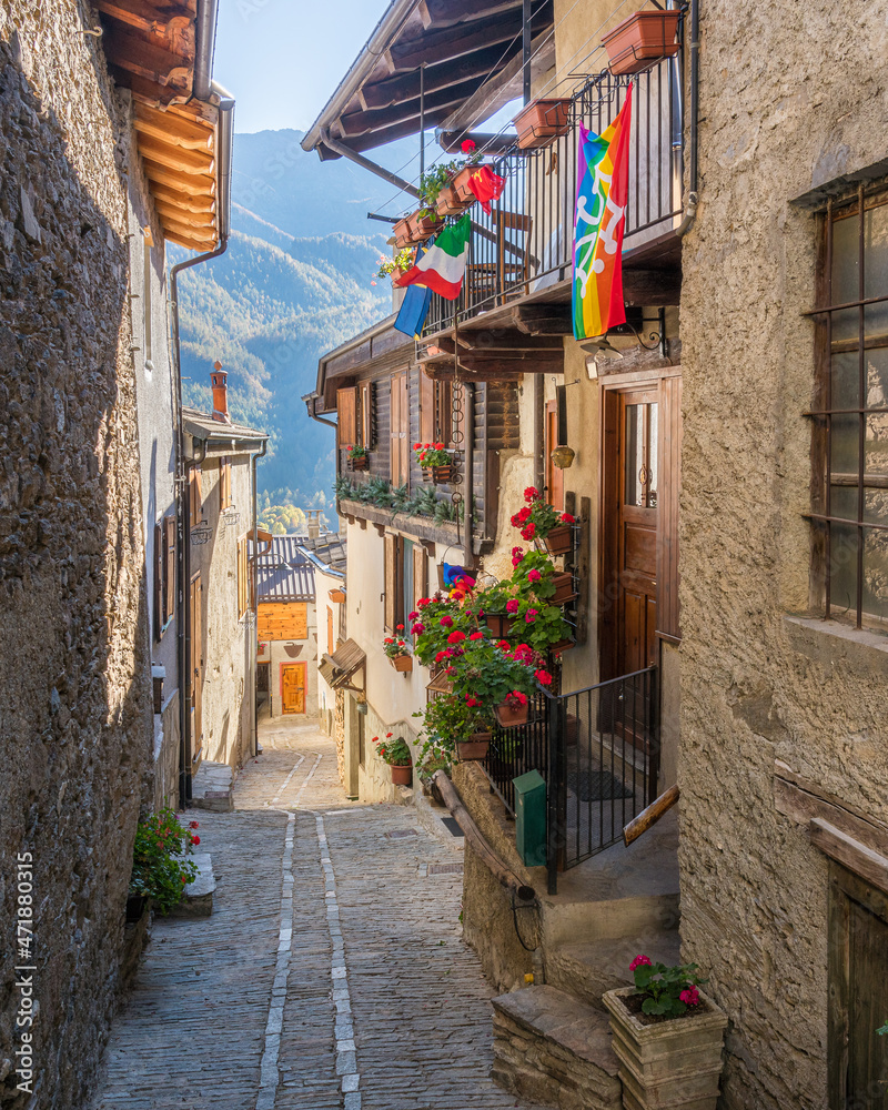 Fototapeta premium The beautiful village of Usseaux, during fall season, in Chisone Valley. Province of Turin, Piedmont, Italy.