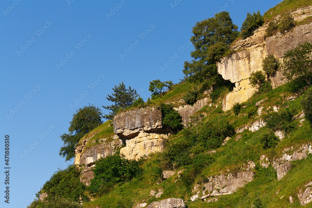 Marvellous view of rocks with forests in gorge in foothills of North Caucasus.