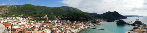 Beautiful panoramic top view at town of Parga,roofs, Ionian sea,Greece from castle. Mediterranean bay,Greek Epirus
