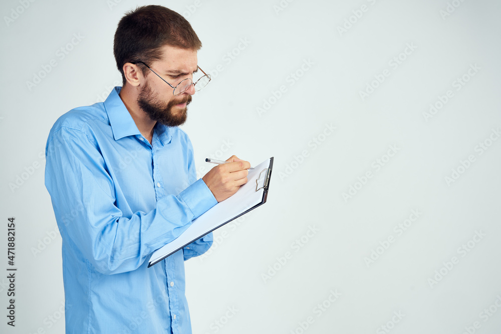 bearded man in blue shirt documents manager professional bearded man in blue shirt documents manager professional