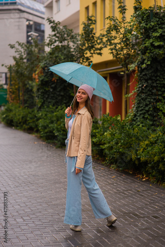 Posing and smiling out on the rain