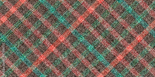tweed fabric texture warm colors diagonal checkered orange and turquoise stripes on brown traditional gingham repeatable ornament for ragged old grungy plaid tablecloths tartan clothes dresses photo