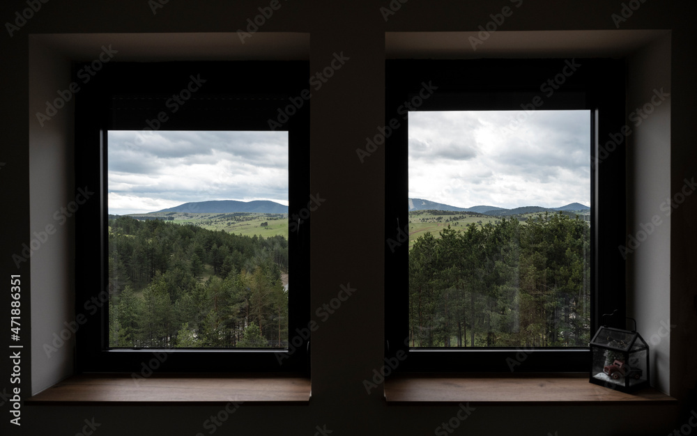 View of the hills through the bedroom window. A view of the freedom . View of the hills through the bedroom window. A view of the freedom .