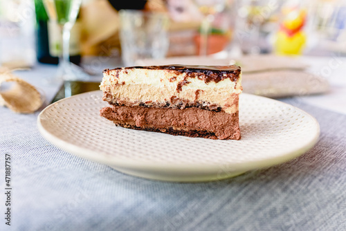 Tasty chocolate cake elegantly served during a wedding.