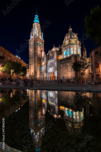 Night view of the cathedral of Toledo reflected in a fountain  Spain.