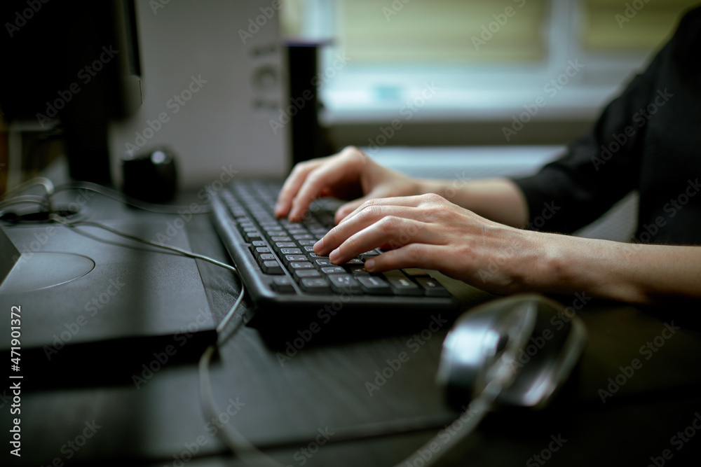 Female hands or woman office worker typing on the keyboard Female hands or woman office worker typing on the keyboard