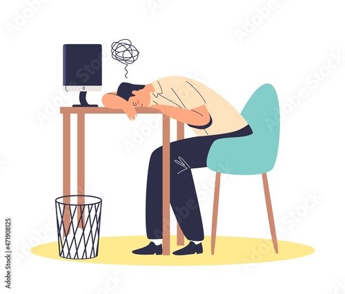Tired and exhausted businessman lying on desktop overworked and overwhelmed at workplace