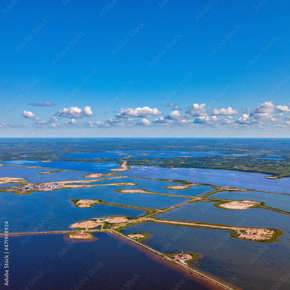 Aerial view of oilfield on the Samotlor lake