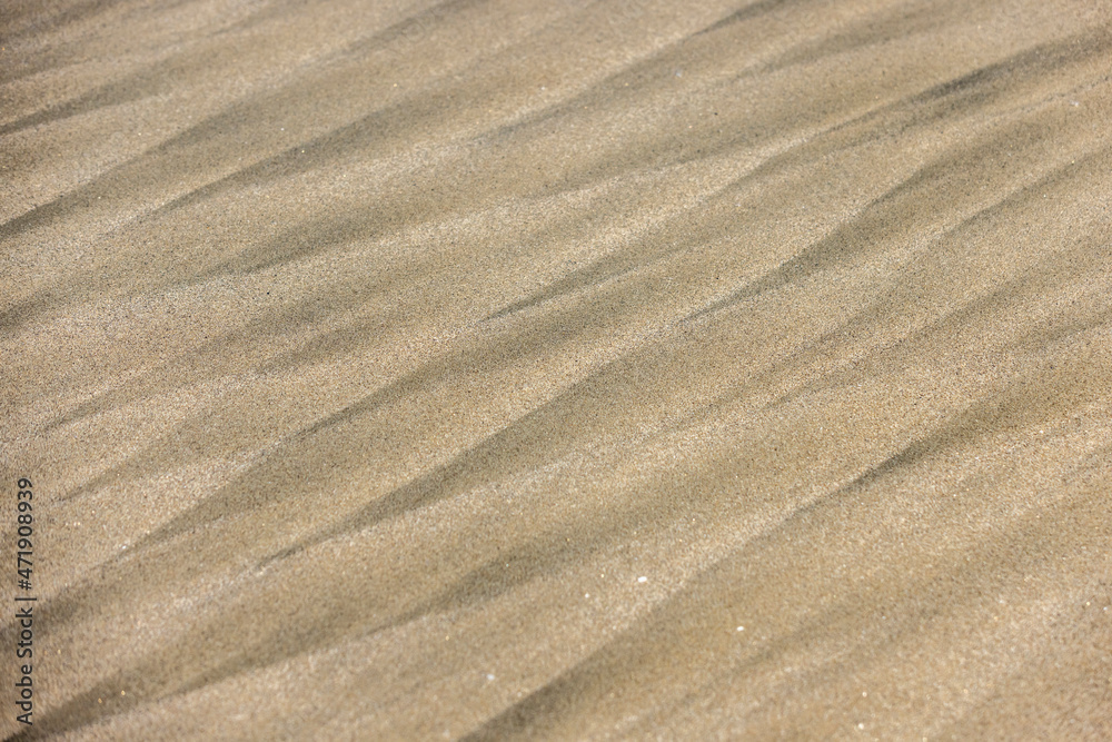 Geometric patterns in the sand left by passing waves Geometric patterns in the sand left by passing waves