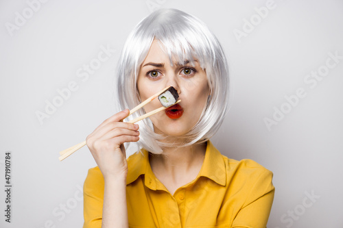 Glamorous Woman in White Wig Sushi Chopsticks