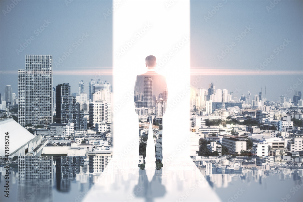 Abstract image of man standing on city background. Success, growth and future concept. Double exposure. Abstract image of man standing on city background. Success, growth and future concept. Double exposure.