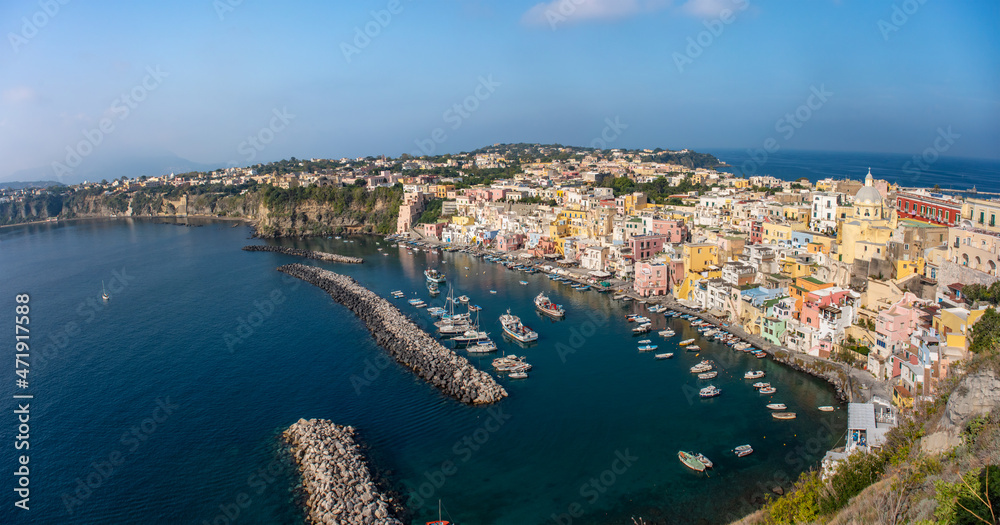 Aerial drone view of Italian island Procida. Marina Corricella and fort