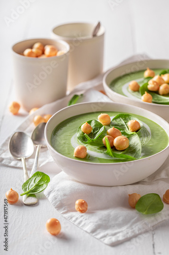 Creamy spinach soup as perfect spring healthy diet.