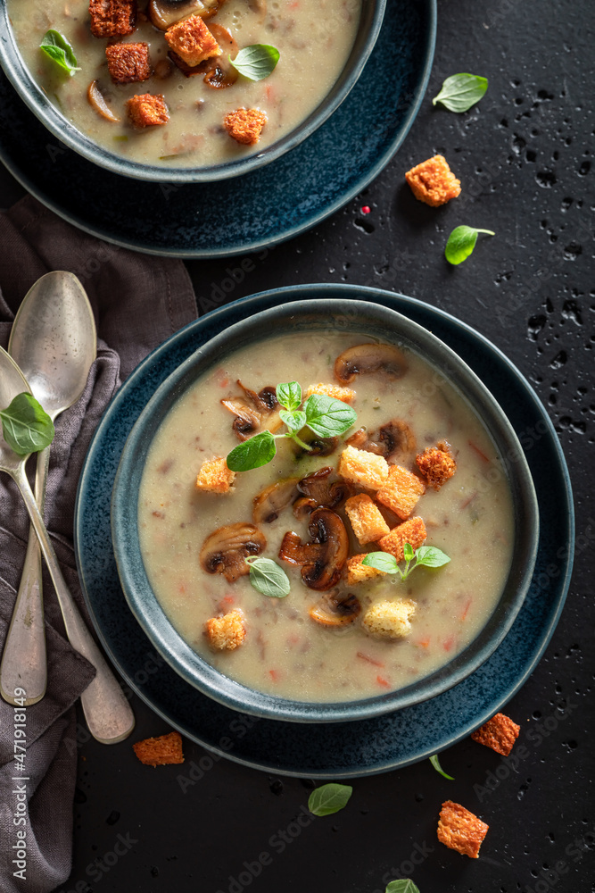 Vegan mushrooms soup as aromatic and hot starter.