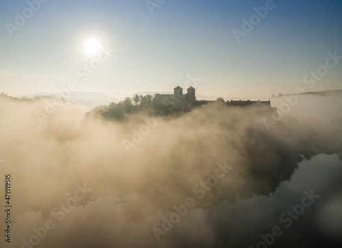 Aerial view of Tyniec abbey in the morning mists, beautiful sunrise, Krakow, Poland
