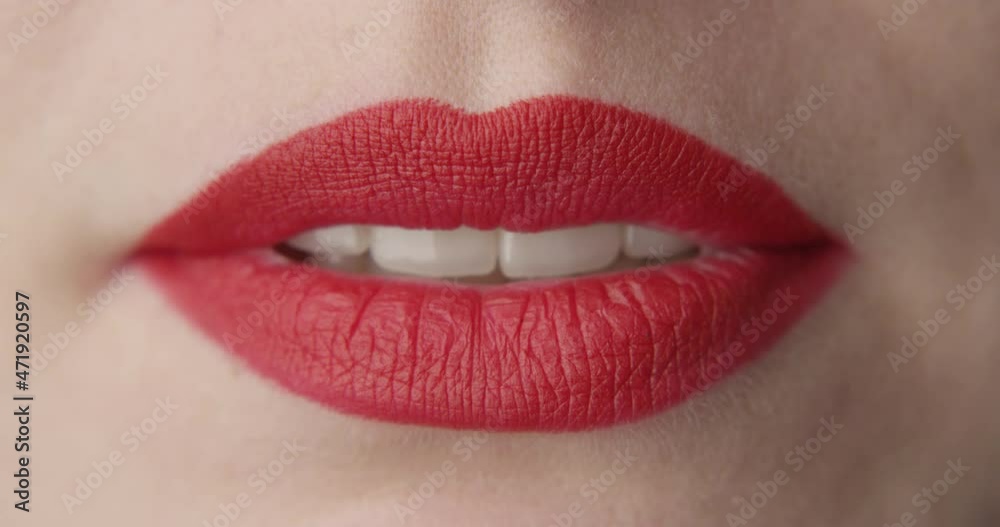 A Close up Shot of Relaxed Red Lips with Neutral Facial Expression A Close up Shot of Relaxed Red Lips with Neutral Facial Expression