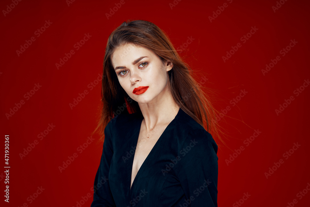 Fototapeta premium red-haired woman with red lips posing hairstyle glamor