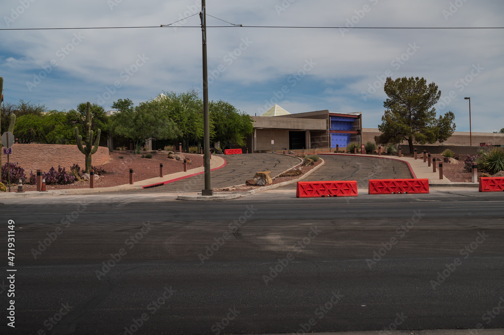 Entrance to Tucson Convention center, barricaded with red blocks. 