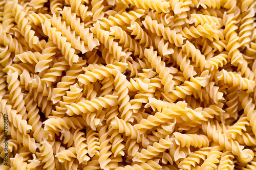 Stack of uncooked fusilli