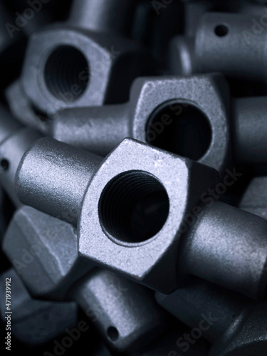 Drilled and machined trunnions for railway freight coupling units photo
