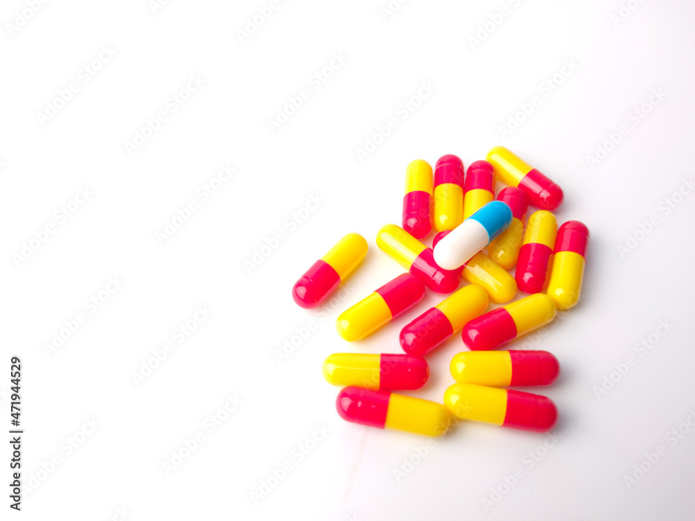 Piles of pills and capsule on white background,isolated,copy space.Selective focus Piles of pills and capsule on white background,isolated,copy space.Selective focus