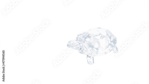 figurine of glass transparent turtle on a white background
