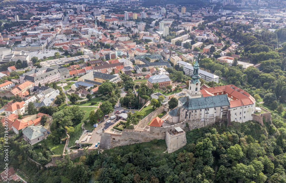 Aerial view of historic Nitra castle in Central Slovakia with towers, bastions, baroque church and bishop palace