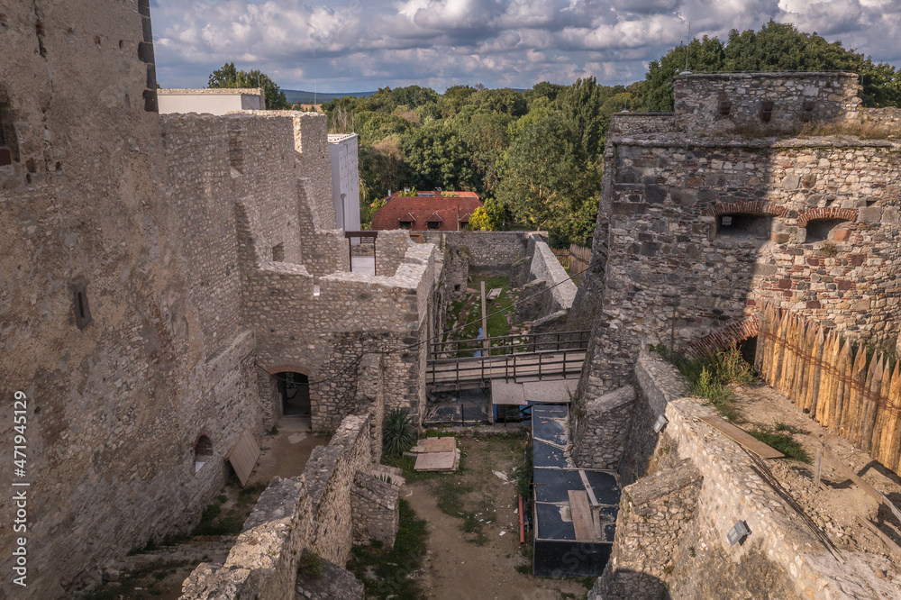 Aerial view of medieval Nagyvazsony castle near the Lake Balaton in Veszprem county Hungary with emblematic donjon, barbican currently under renovation 