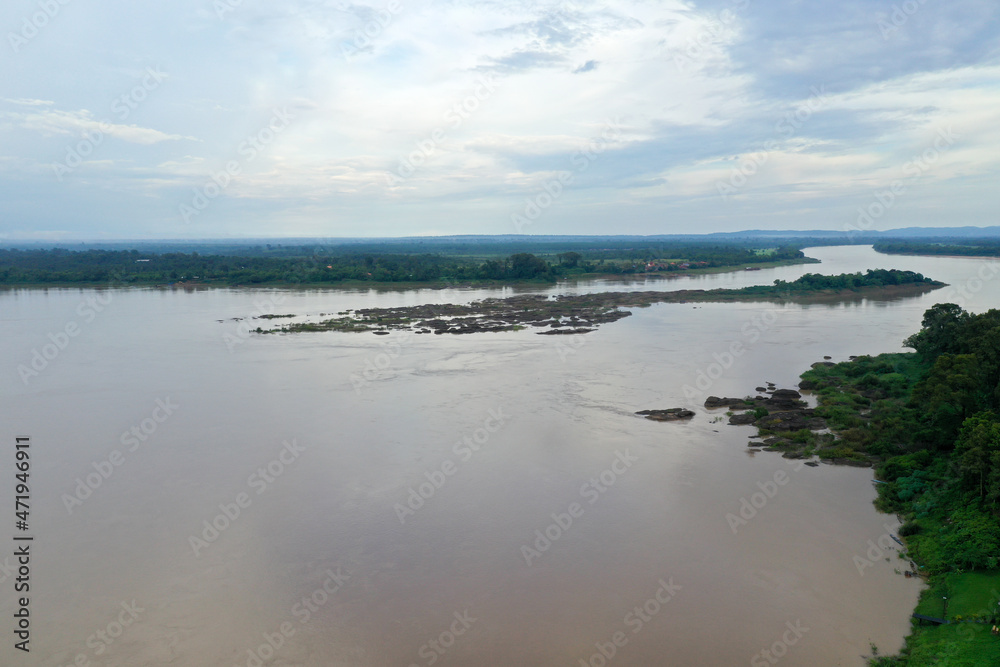 Aerial view of the Mekong river shorting from drone in the cloudy day at Champasak province, Laos.