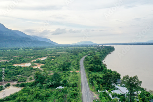 aerial view of a road along the Mekong river at Champasak, Laos