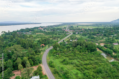 Scenic aerial view flying over the land field.